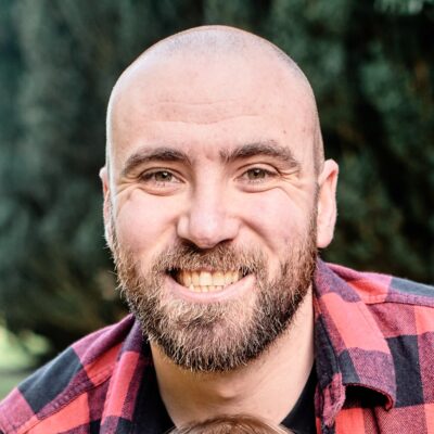 Headshot of Alex Dibb